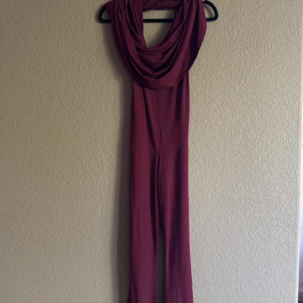 Warrior within burgundy jumpsuit